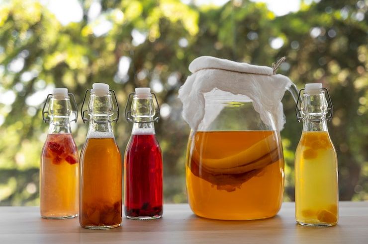 still-life-kombucha-bottle_23-2150621489.jpg